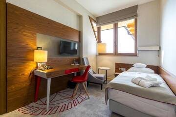 Фото номера Люкс с видом на горы Отель Hotel Kopieniec Fizjo- Med &amp; SPA г. Мужасихле 4
