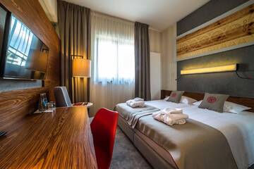 Фото номера Двухместный номер эконом-класса с 1 кроватью Отель Hotel Kopieniec Fizjo- Med &amp; SPA г. Мужасихле 5